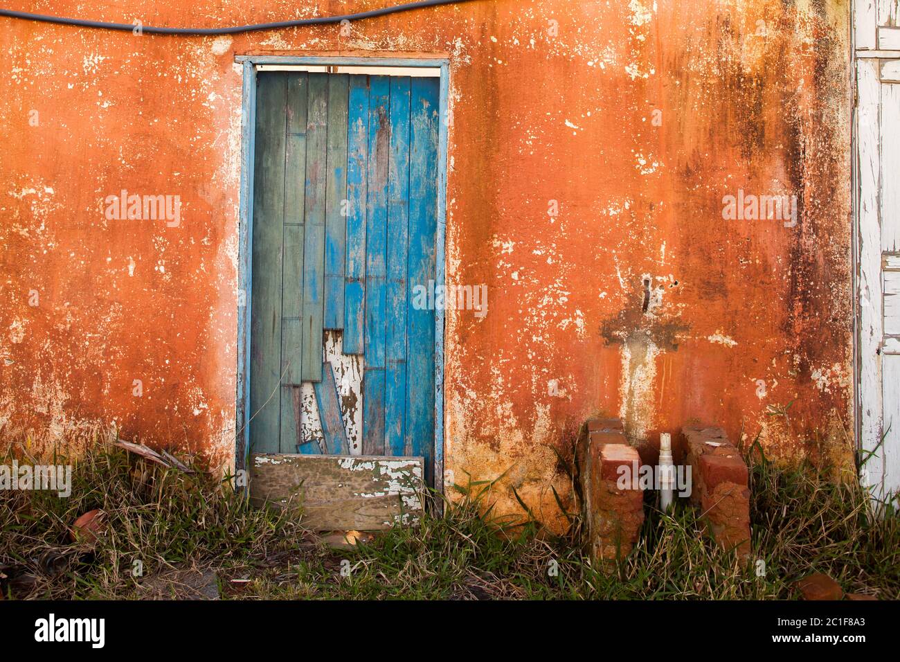 Old blue colored door in abandoned house in countryside Stock Photo - Alamy