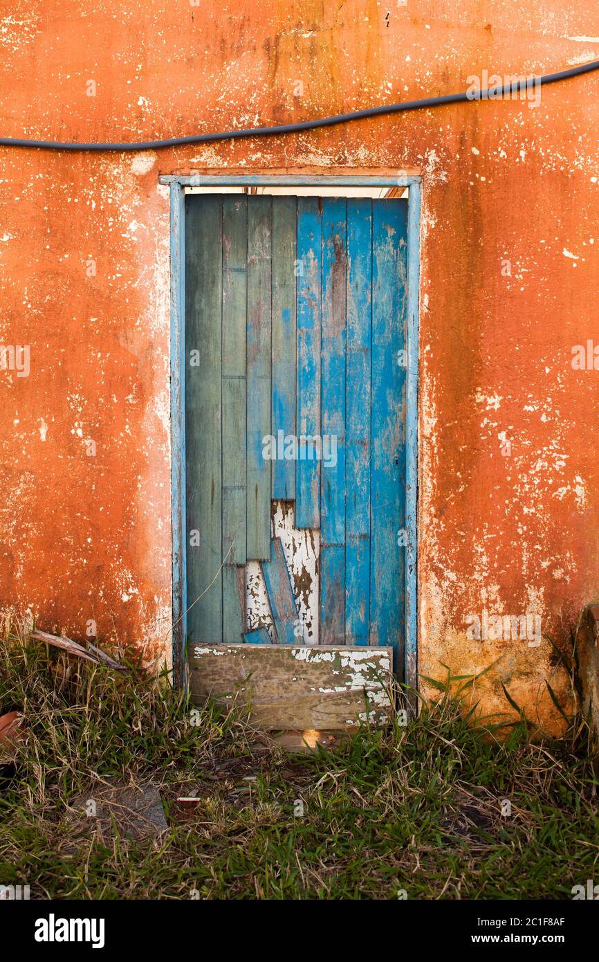 Old blue colored door in abandoned house in countryside Stock Photo - Alamy