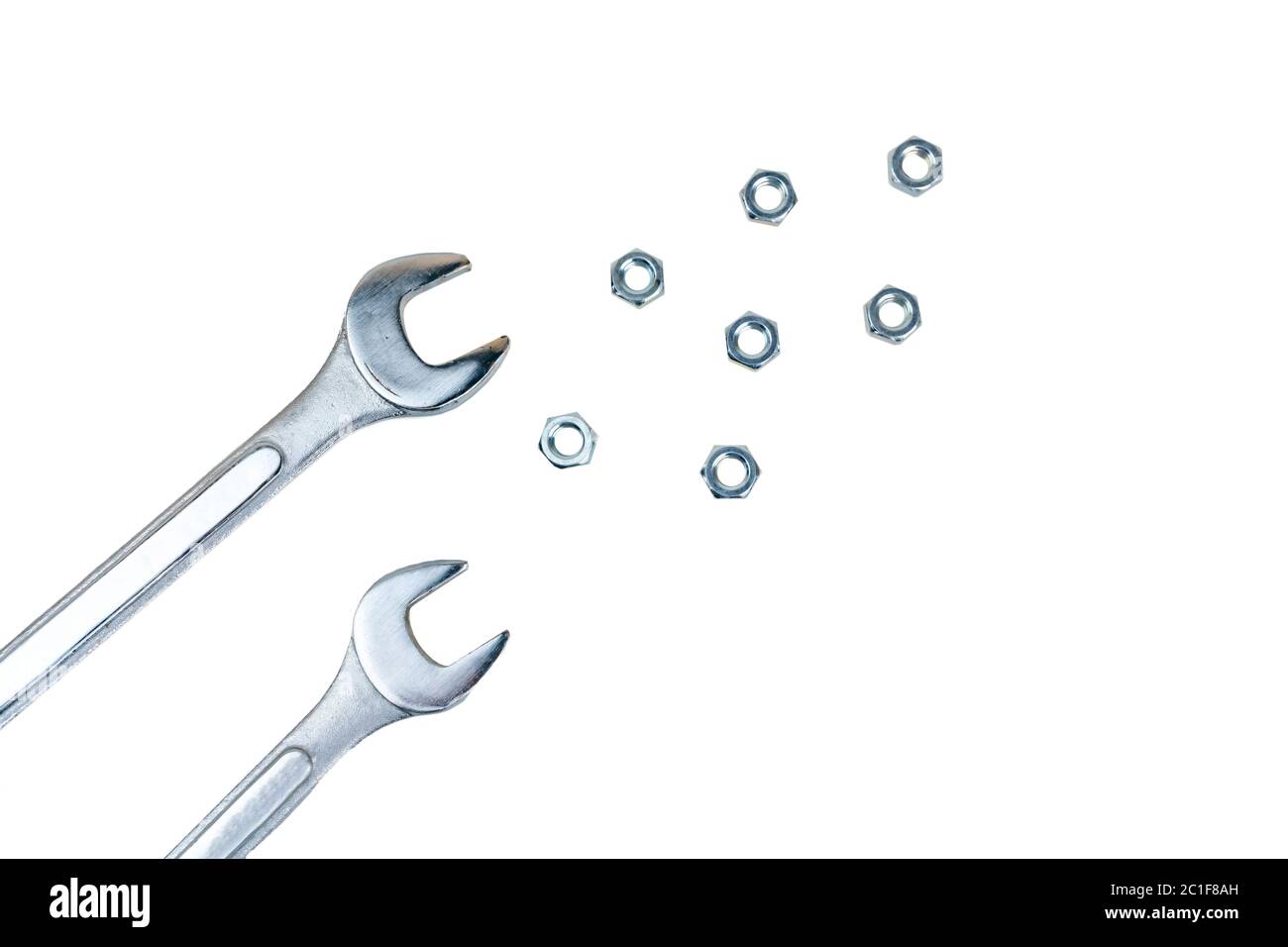Spanners and screw nuts isolated on white background Stock Photo