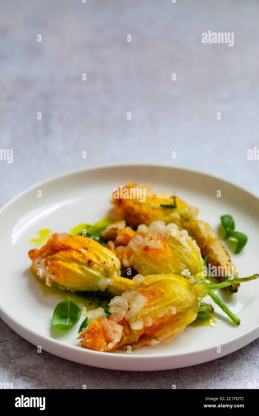 Fried courgette flowers stuffed with ricotta cheese in light tempura