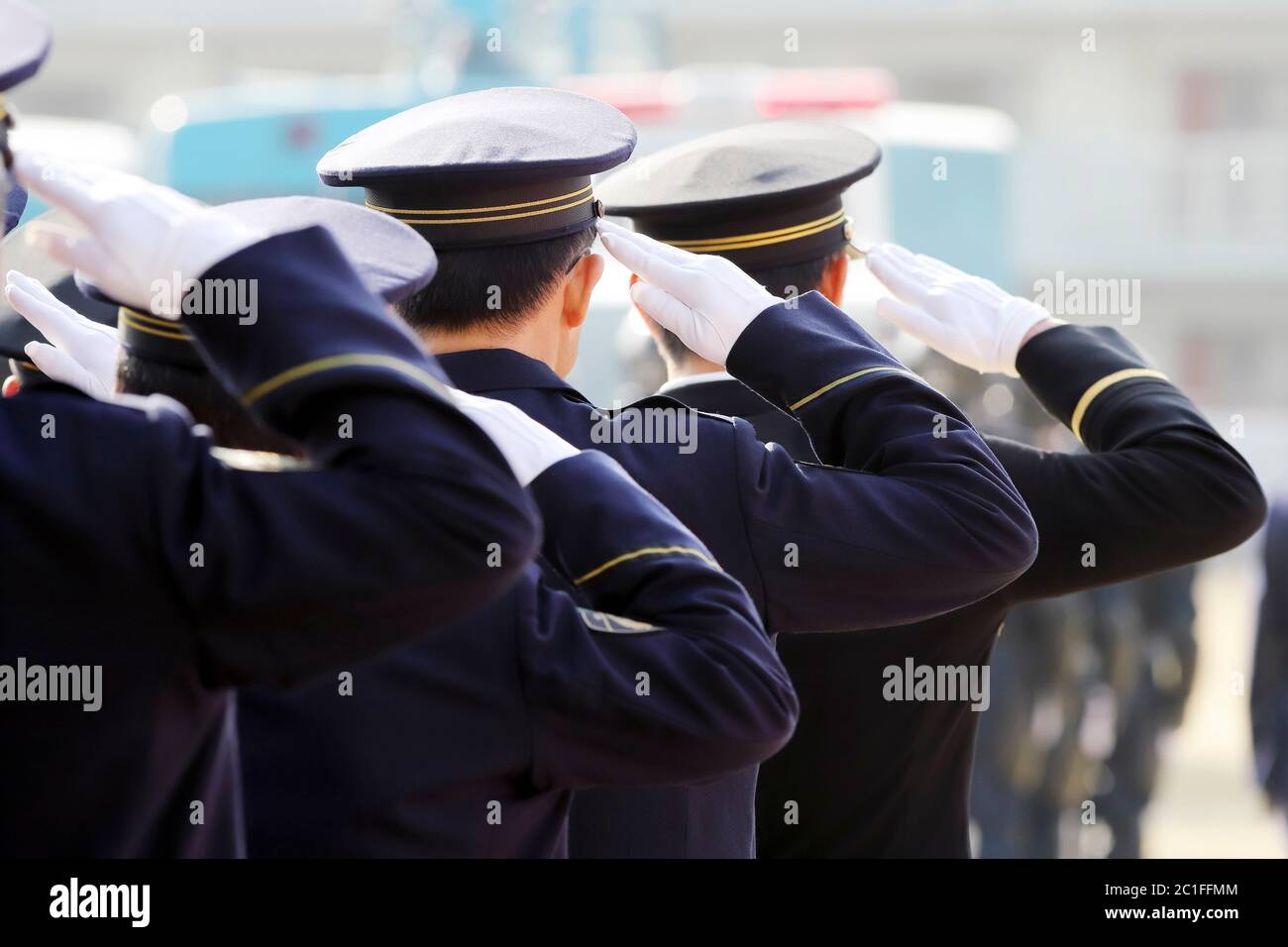 Saluting Japanese police officers, Sietusiki ceremony Stock Photo