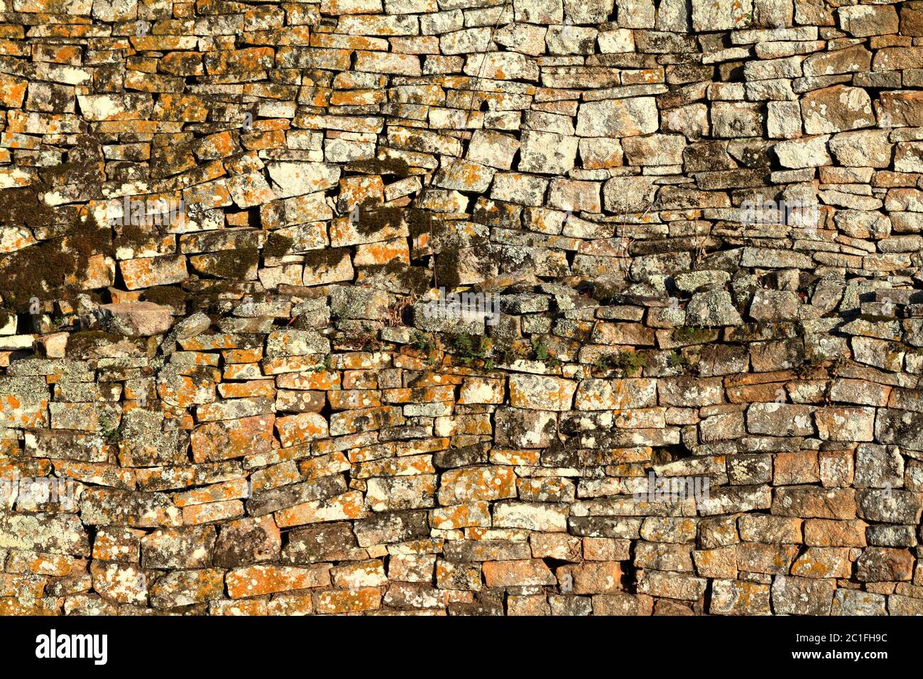 Natural stone wall and background Stock Photo - Alamy