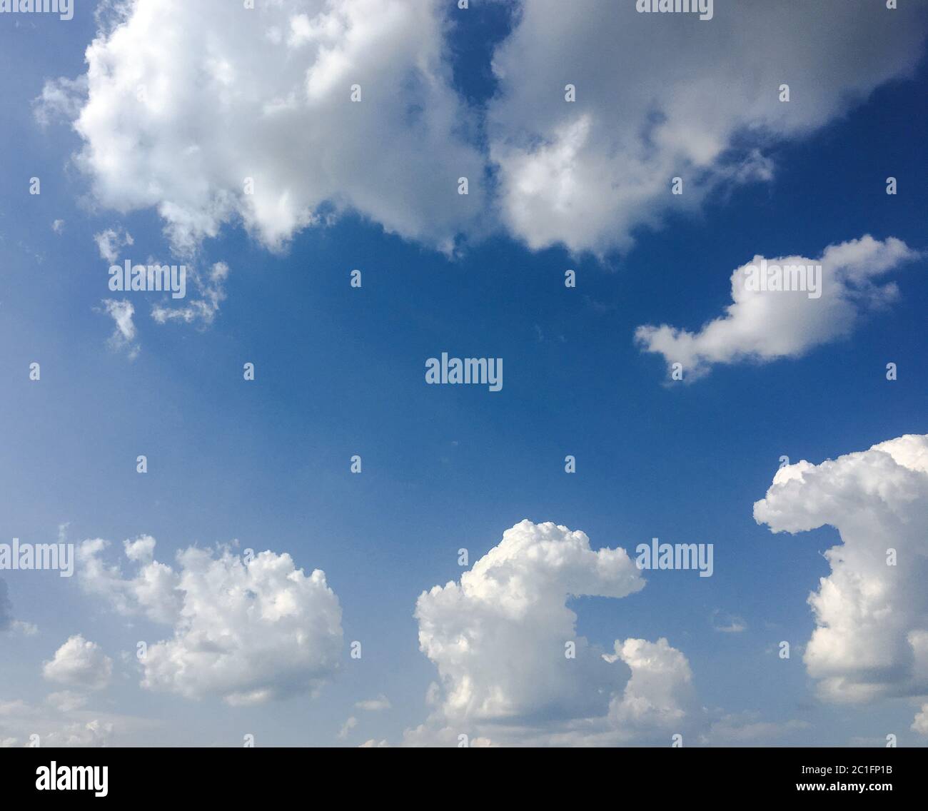 Beautiful clouds against a blue sky background. Cloud sky. Blue sky with cloudy weather, nature cloud. White clouds, blue sky an Stock Photo