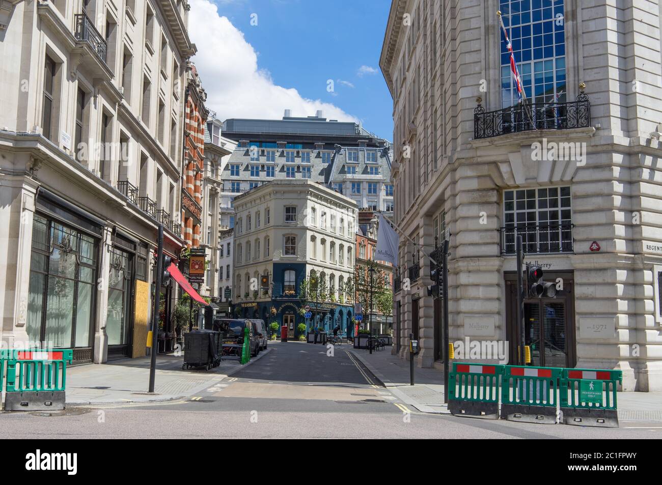 Regent Street looking down Glasshouse Street on a sunny day. London Stock Photo