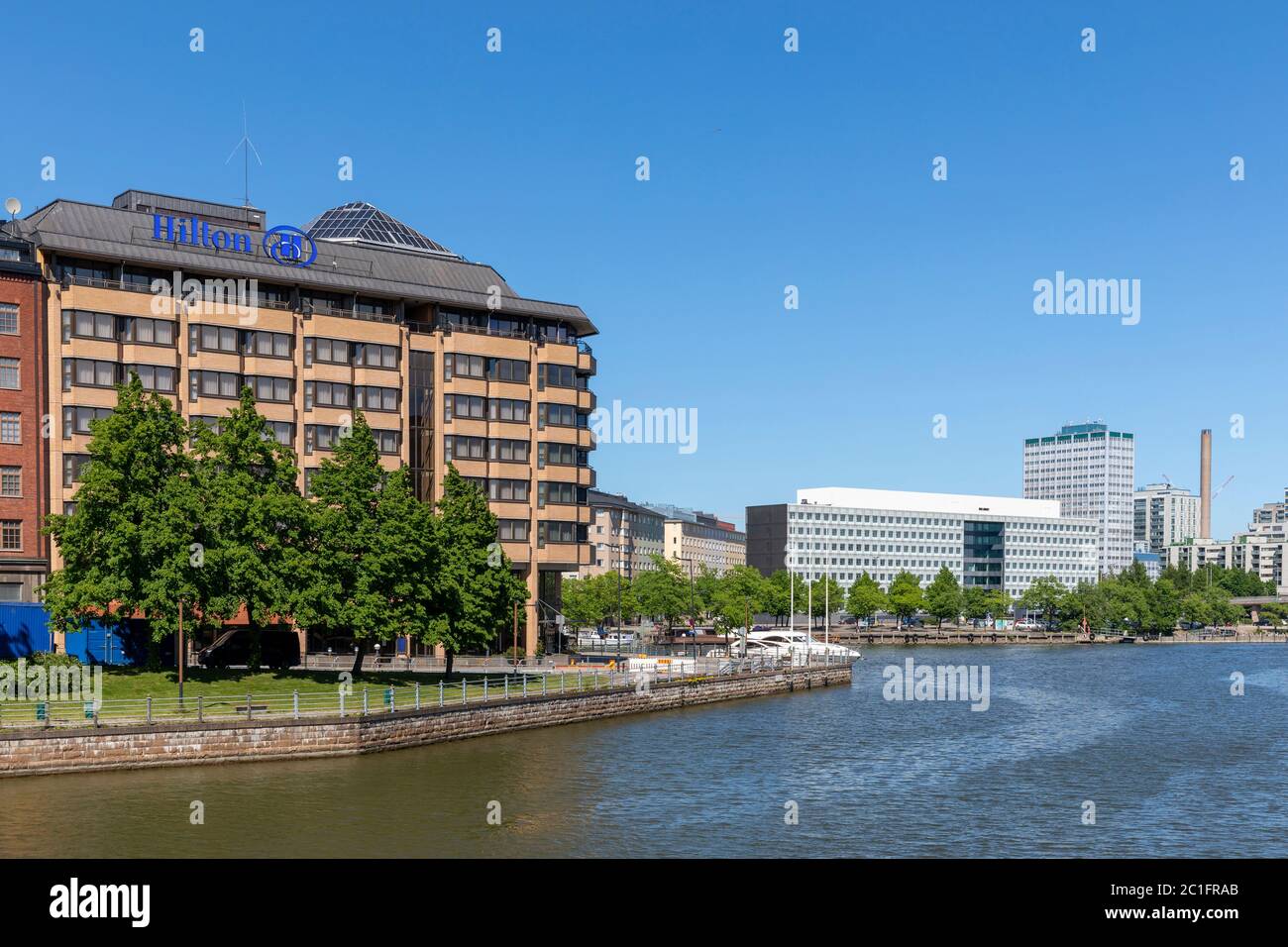 Siltavuorensalmi -strait leads waterway from baltic sea to heart of Helsinki. Waterfront buildings include hotels, offices and residential buildings. Stock Photo