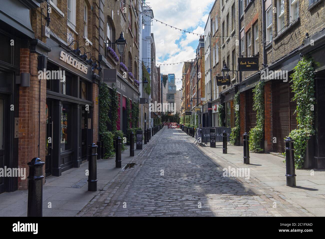 The shops on Floral Street in Covent Garden with no people on a clear sunny  day. London Stock Photo - Alamy