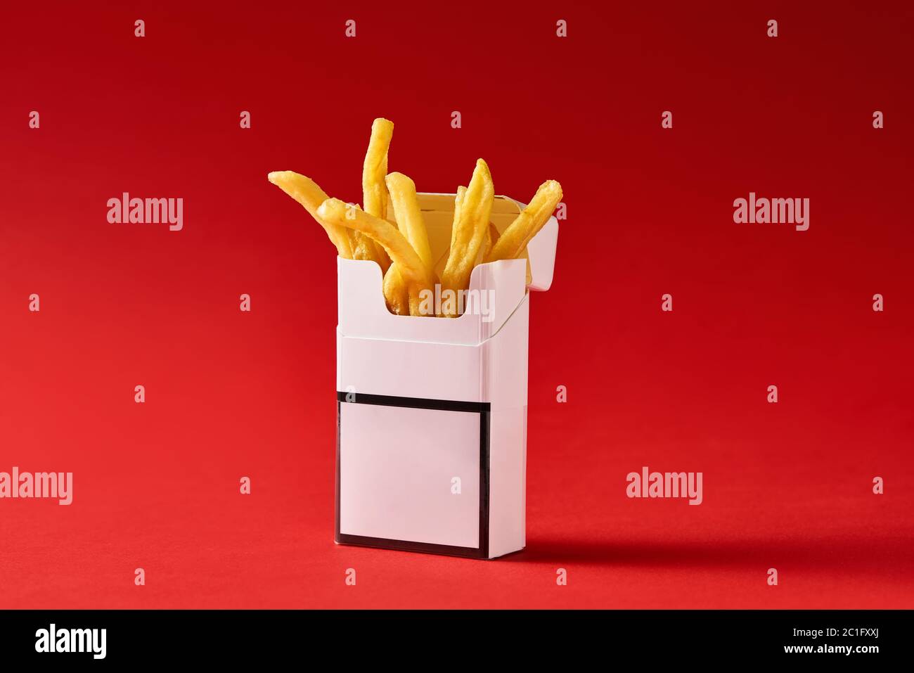 Cigarette pack with fries Stock Photo