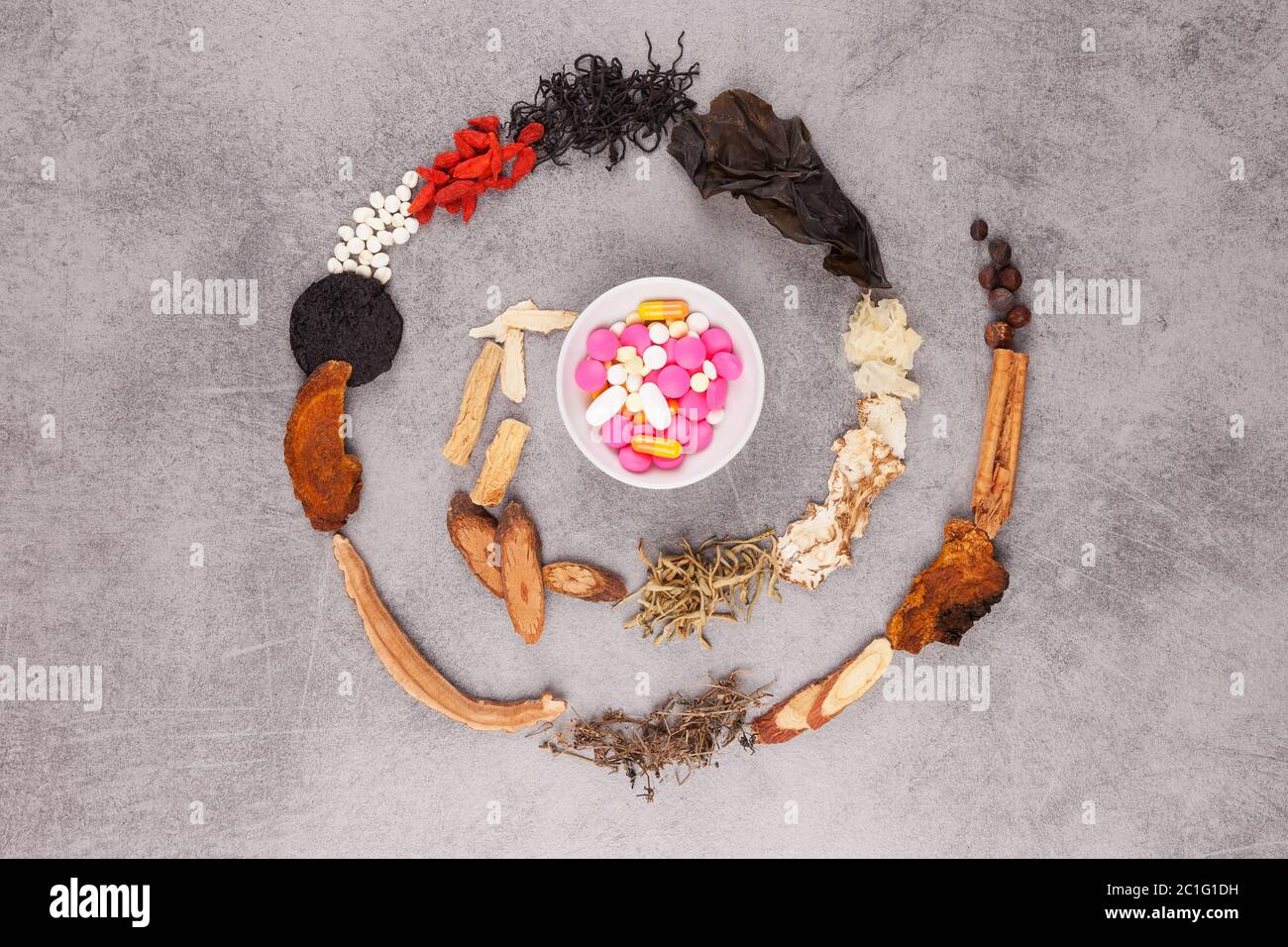 Western and traditional chinese medicine spiral Stock Photo Alamy