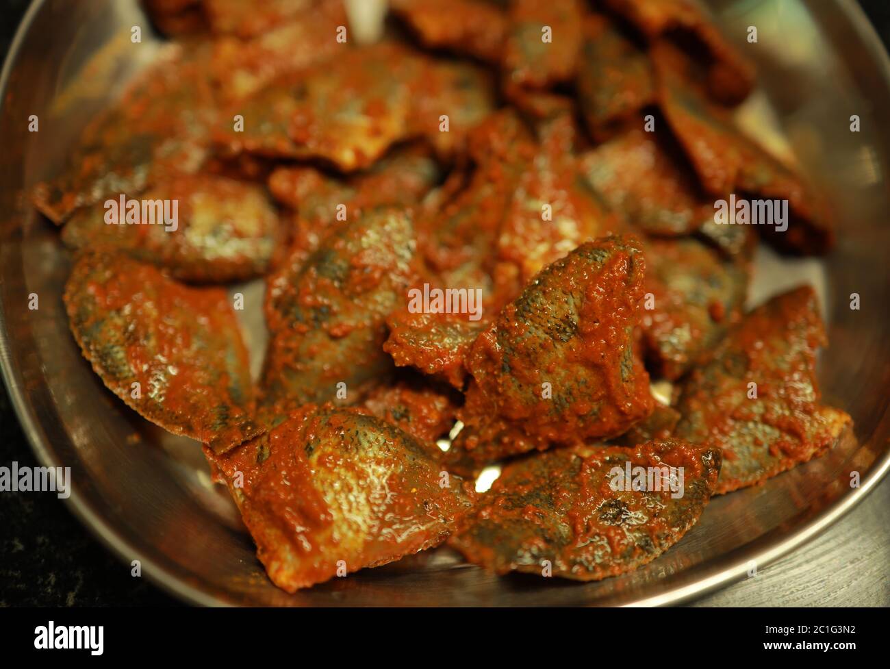 Kerala style pallathi fish Fry Recipe. Scientific name etroplus maculatus Stock Photo