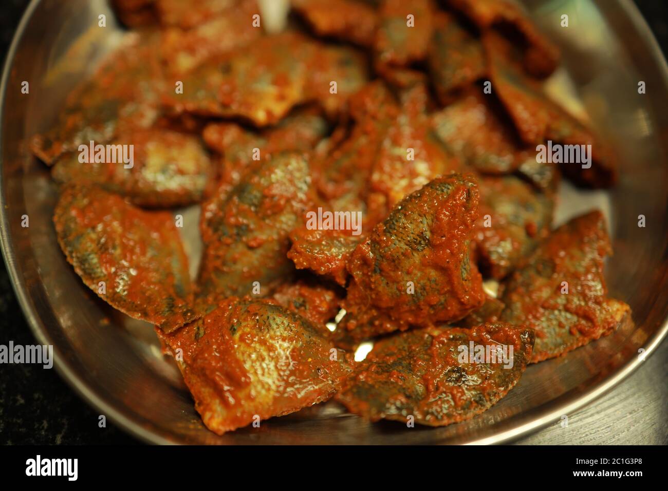 Kerala style pallathi fish Fry Recipe. Scientific name etroplus maculatus Stock Photo