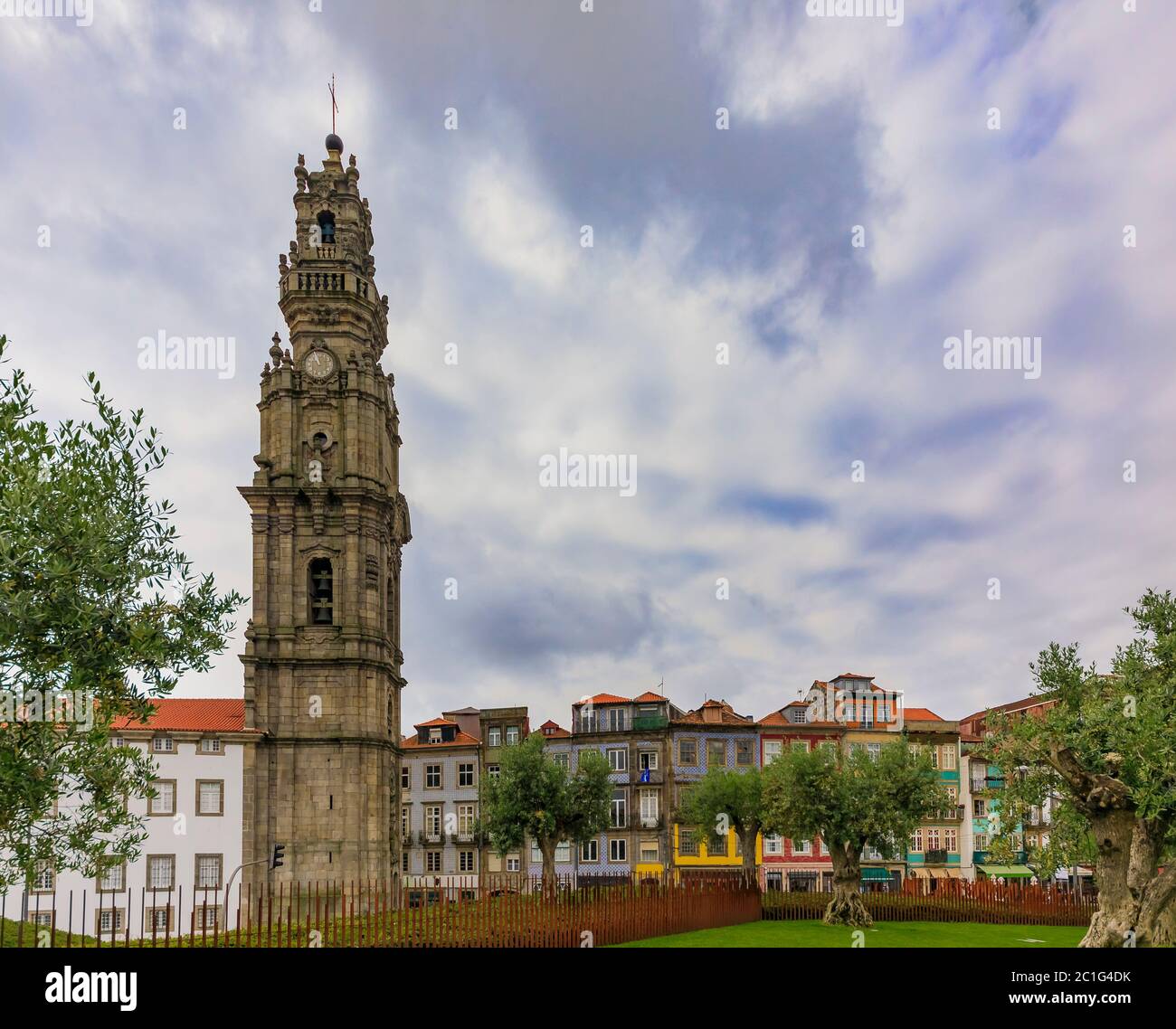 Cityscape with Torre dos Clerigos church bell tower and traditional houses with ornate Portuguese azulejo tiles in the old town Porto, Portugal Stock Photo