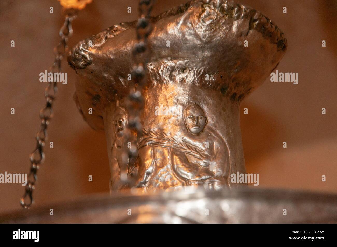 Detail of the metal censer with bas-relief decorations in the Basilica of San Gavino. Porto Torres Stock Photo
