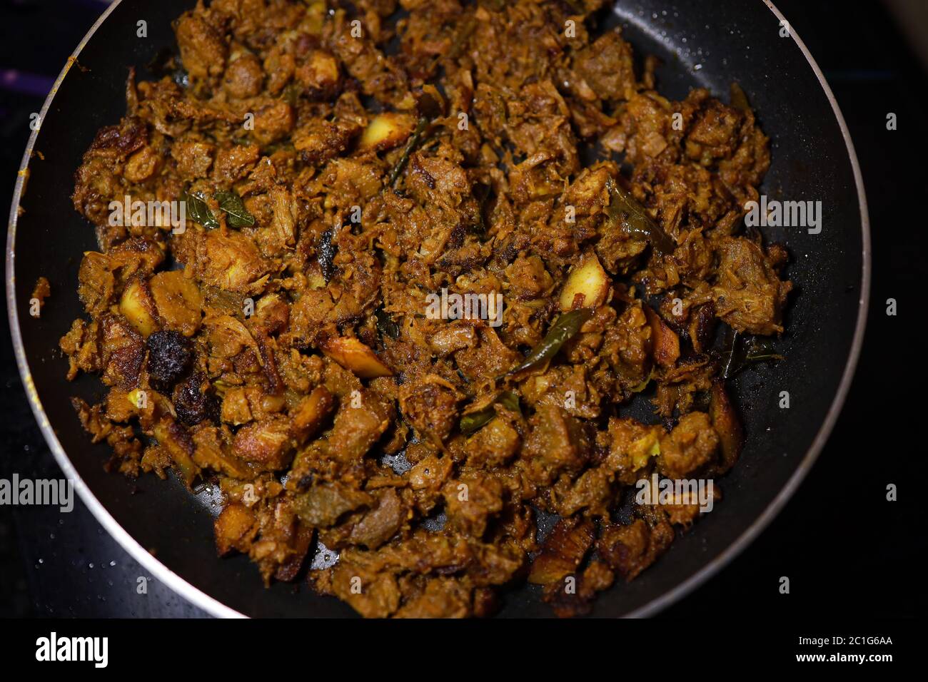 South Indian dish spicy beef fry Kerala, India. side dish ghee