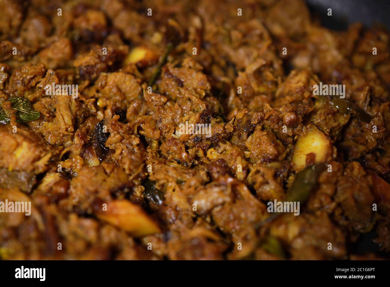 South Indian dish spicy beef fry Kerala, India. side dish ghee