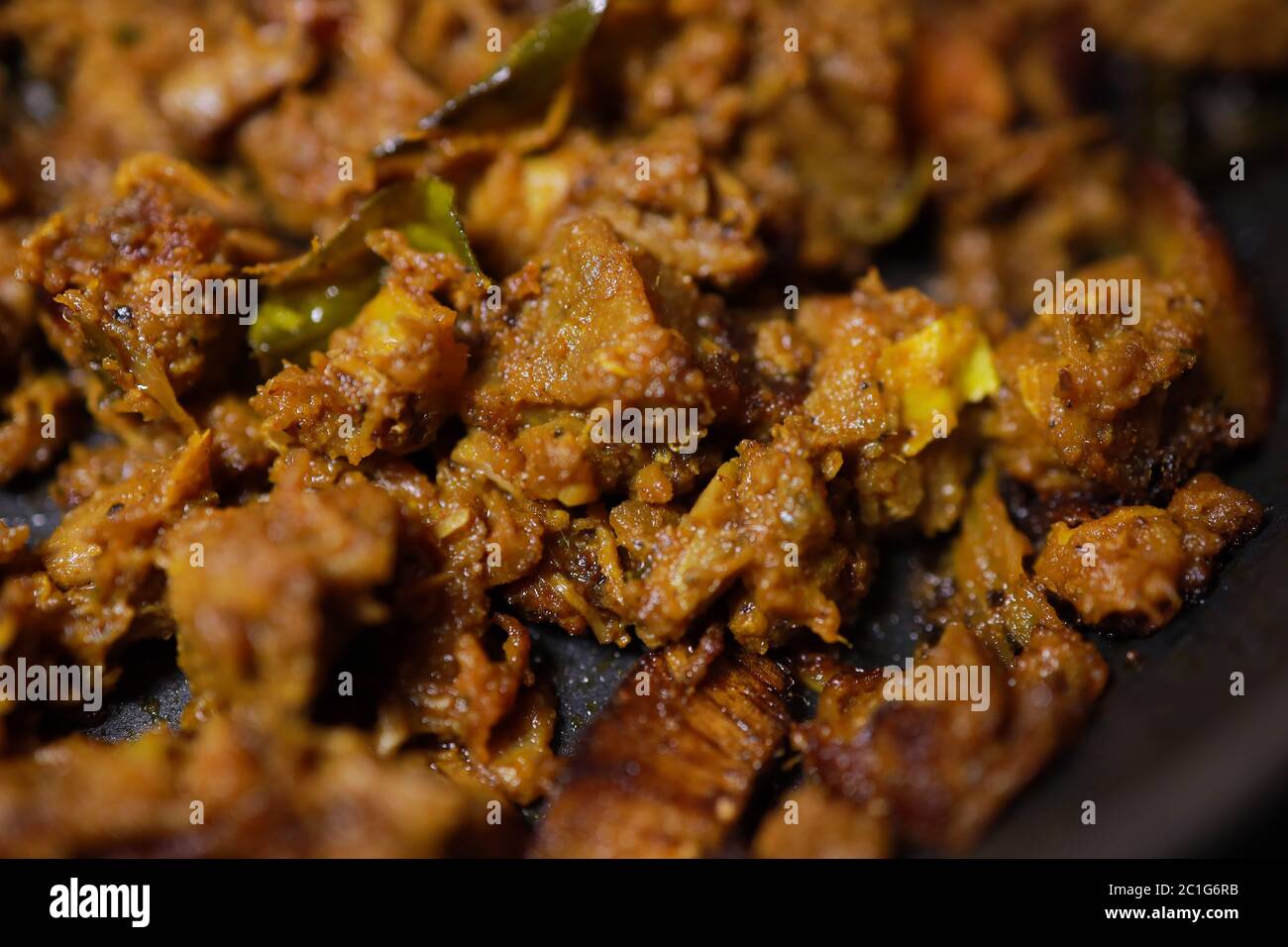 South Indian dish spicy beef fry Kerala, India. side dish ghee rice