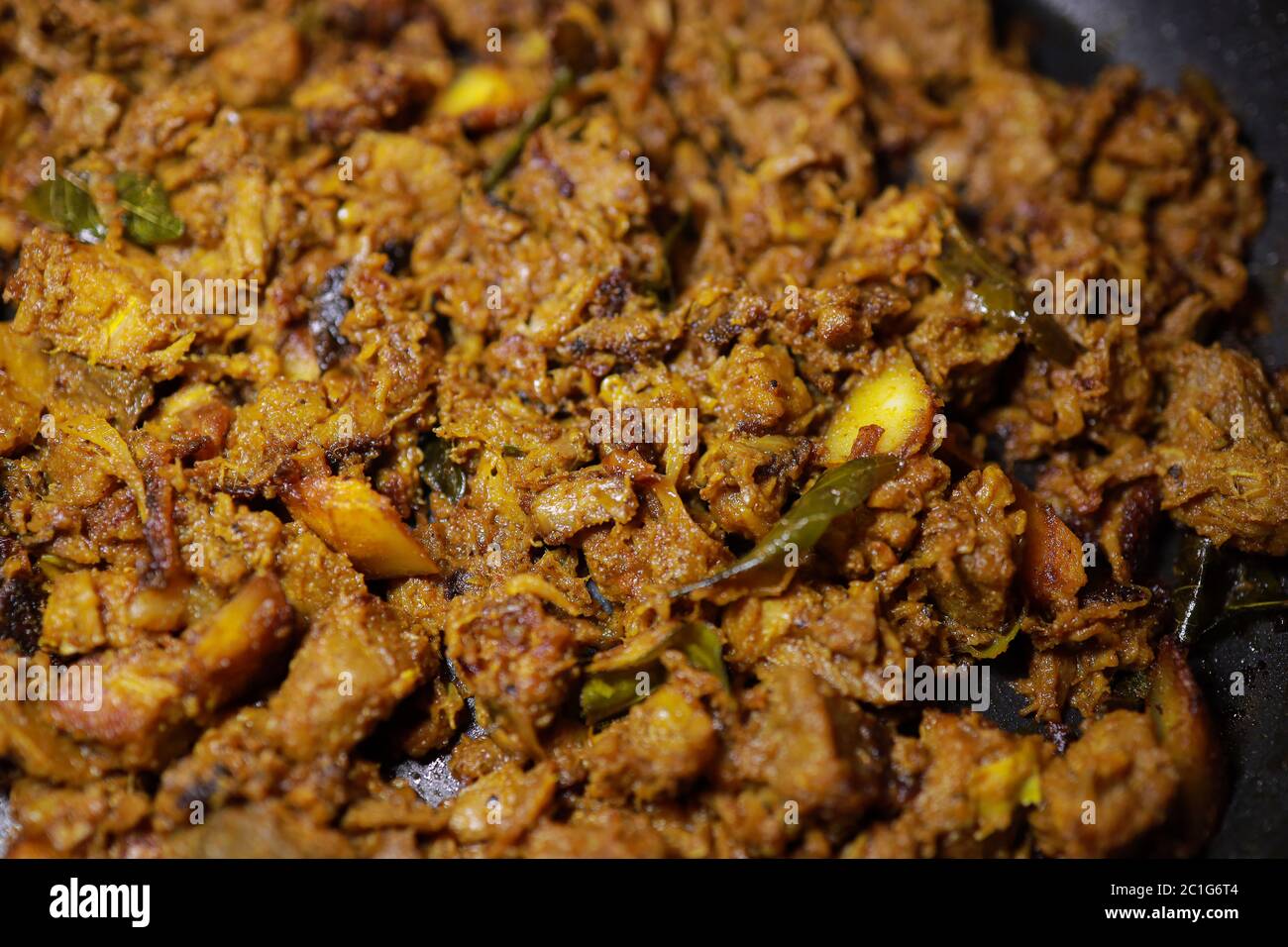 South Indian dish spicy beef fry Kerala, India. side dish ghee rice, appam, parotta, puttu