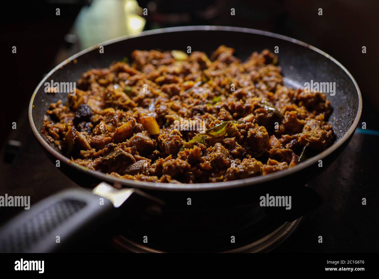 South Indian dish spicy beef fry Kerala, India. side dish ghee rice