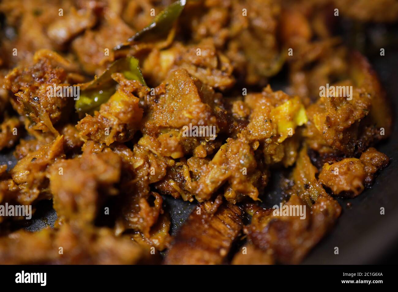 South Indian dish spicy beef fry Kerala, India. side dish ghee rice