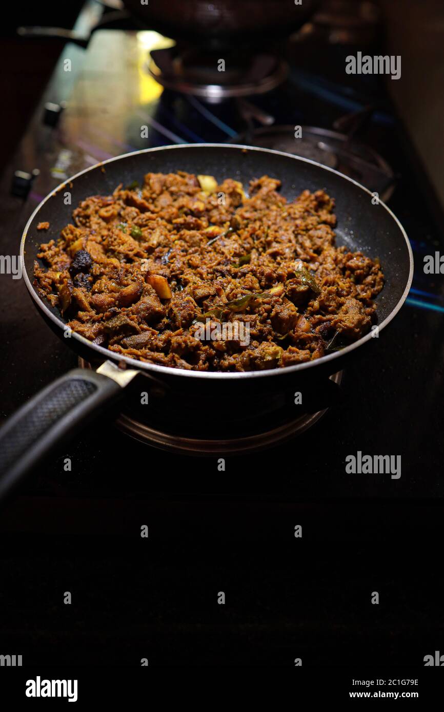 South Indian dish spicy beef fry Kerala, India. side dish ghee rice, appam, parotta, puttu