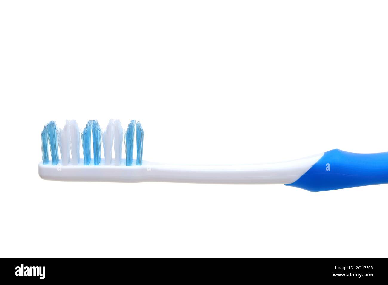 Blue toothbrush isolated on a white background Stock Photo - Alamy