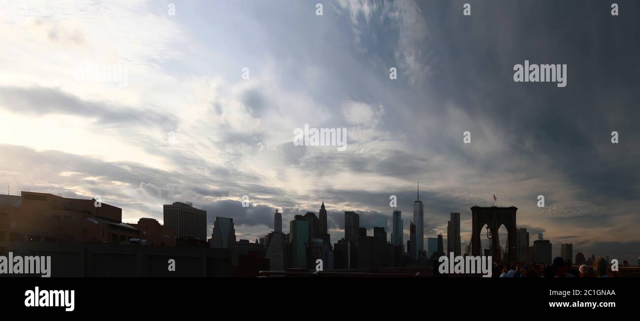 Panoramic sunset view of downtown Manhattan skyline from Brooklyn. New York. USA. Stock Photo