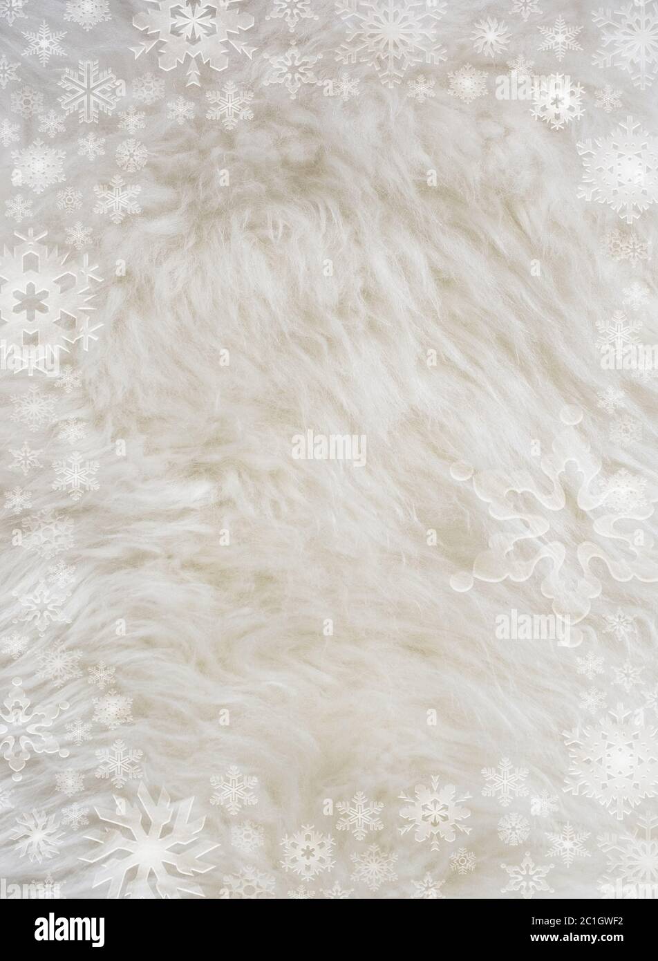 Fluffy white furry sheepskin and snowflakes Stock Photo - Alamy