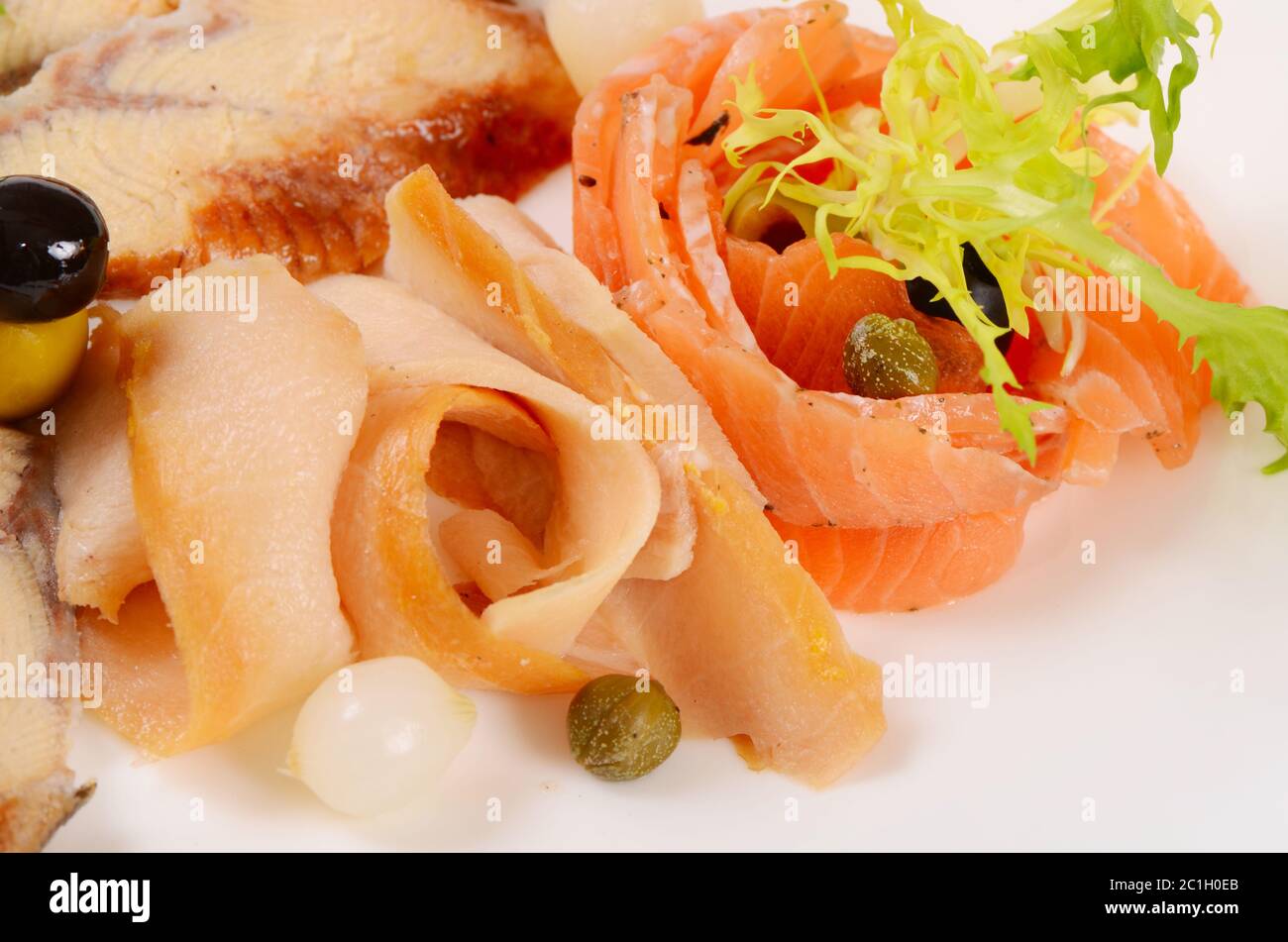 Cutting different fish in the restaurant Stock Photo