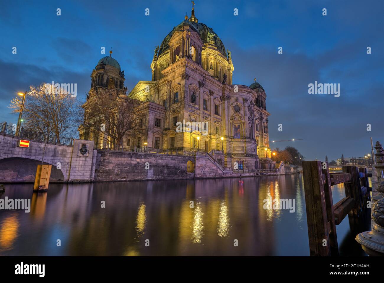 The Berlin Cathedral with the river Spree at dusk Stock Photo