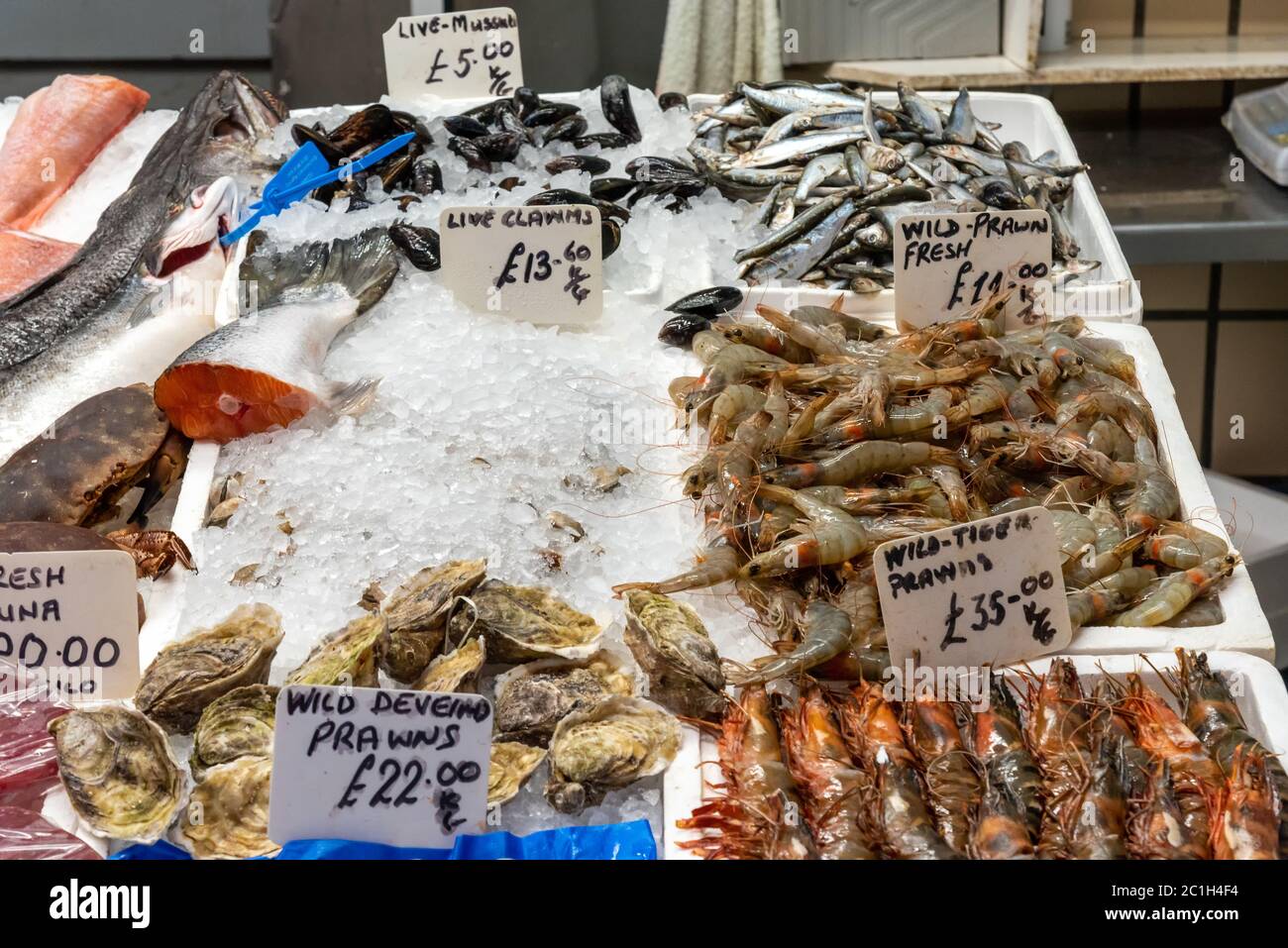Clamms and crustaceans for sale at a market Stock Photo