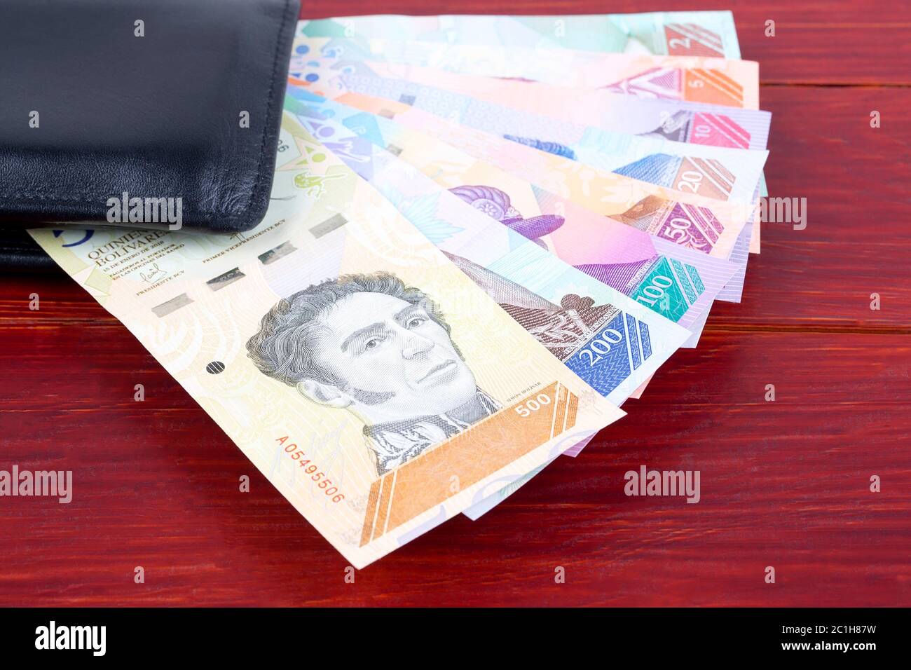Venezuelan money from the new series in the black wallet Stock Photo