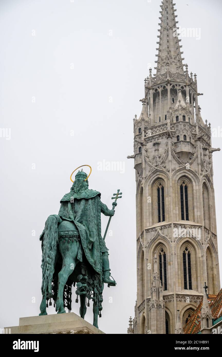 St. Matthias Church is a Roman Catholic church in Budapest and  statue of Stephen I in its front . Stock Photo