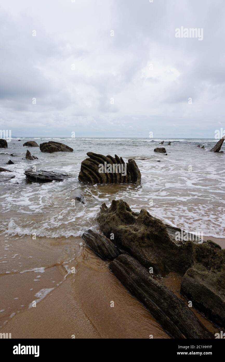 sand and rocks in the beach Stock Photo - Alamy