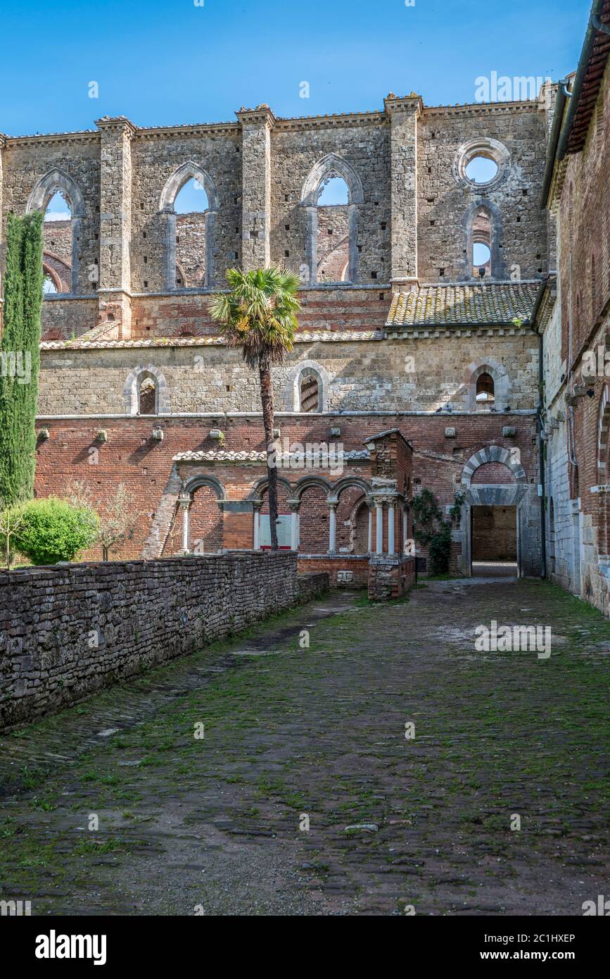 Part of the reconstructed cloister of the Abbey of San Galgano Stock Photo