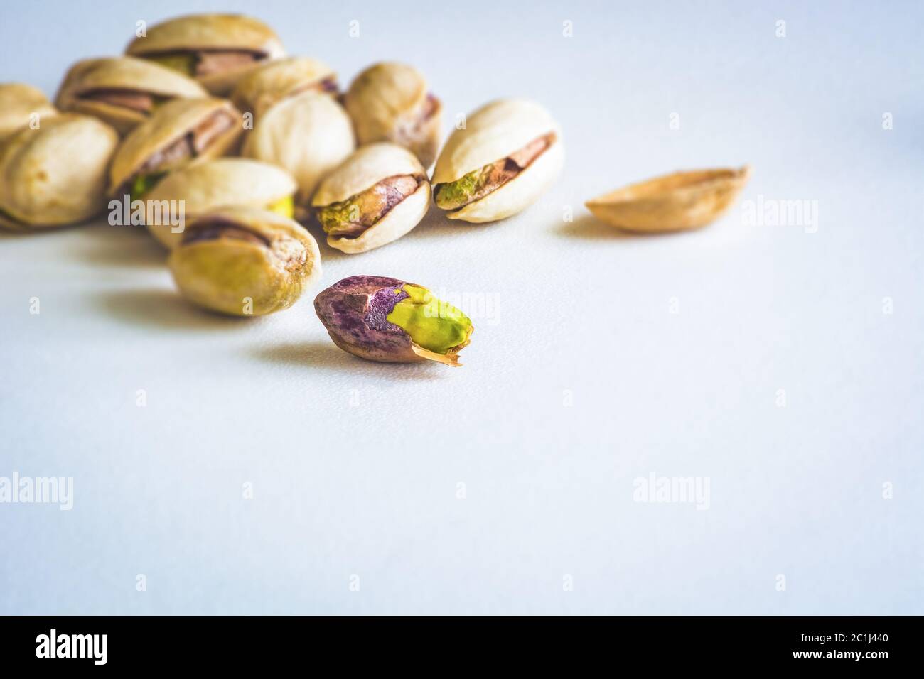 Close Up Group Of Dry, Fresh And Large Raw Pistachio Nuts In Shell