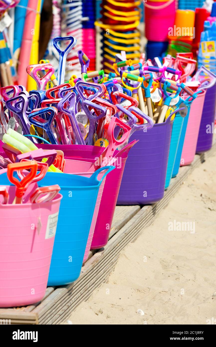 Children’s buckets and spades for sale on Weymouth Beach, Dorset