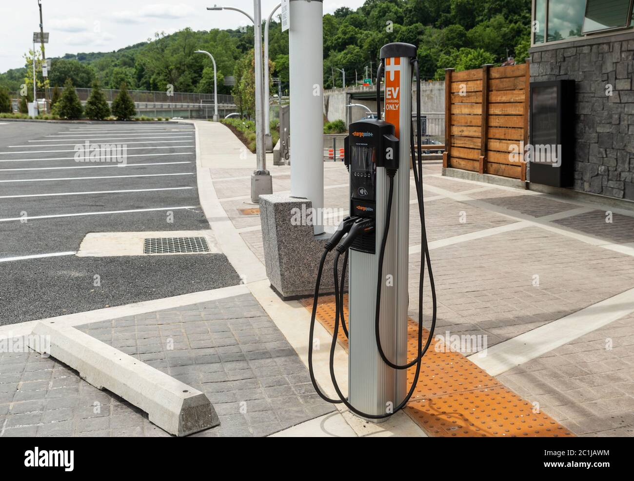 Tarrytown, NY - June 15, 2020: Electric vehicle charging station seen at Rockland landing of Mario Cuomo Bridge in Tarrytown. Stock Photo