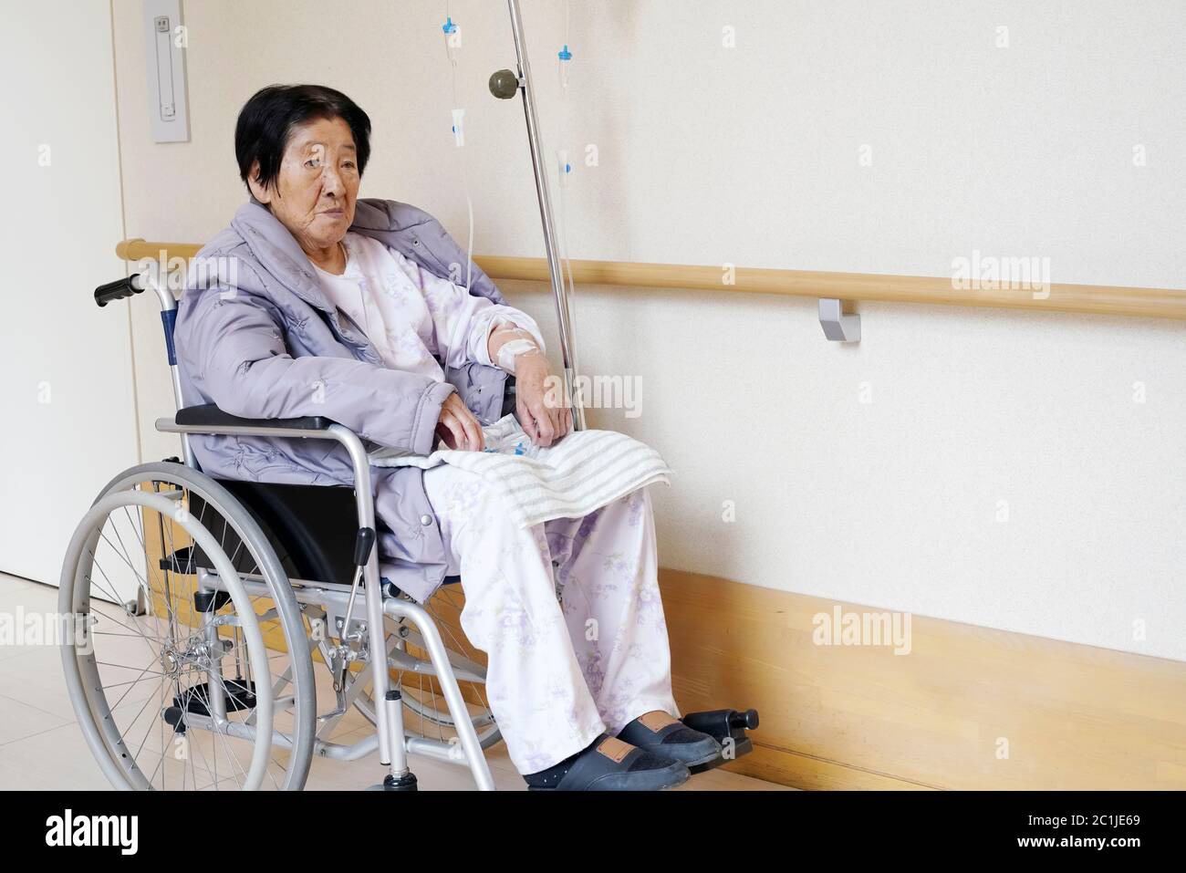 Sad old woman in wheelchair hi-res stock photography and images - Alamy
