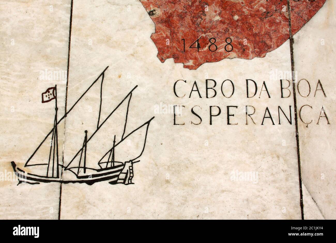 Portugal Lisbon Belem Detail of huge wind rose laid in marble depicting the Portuguese discovery expeditions - caravel passing the Cape of Good Hope. Stock Photo