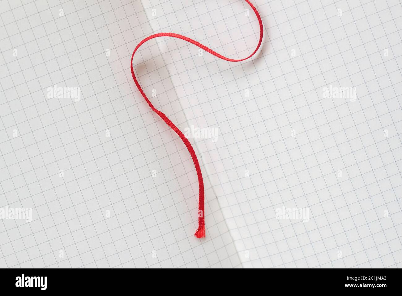 Page for notebook, squared notebook and red bookmark, background for design Stock Photo