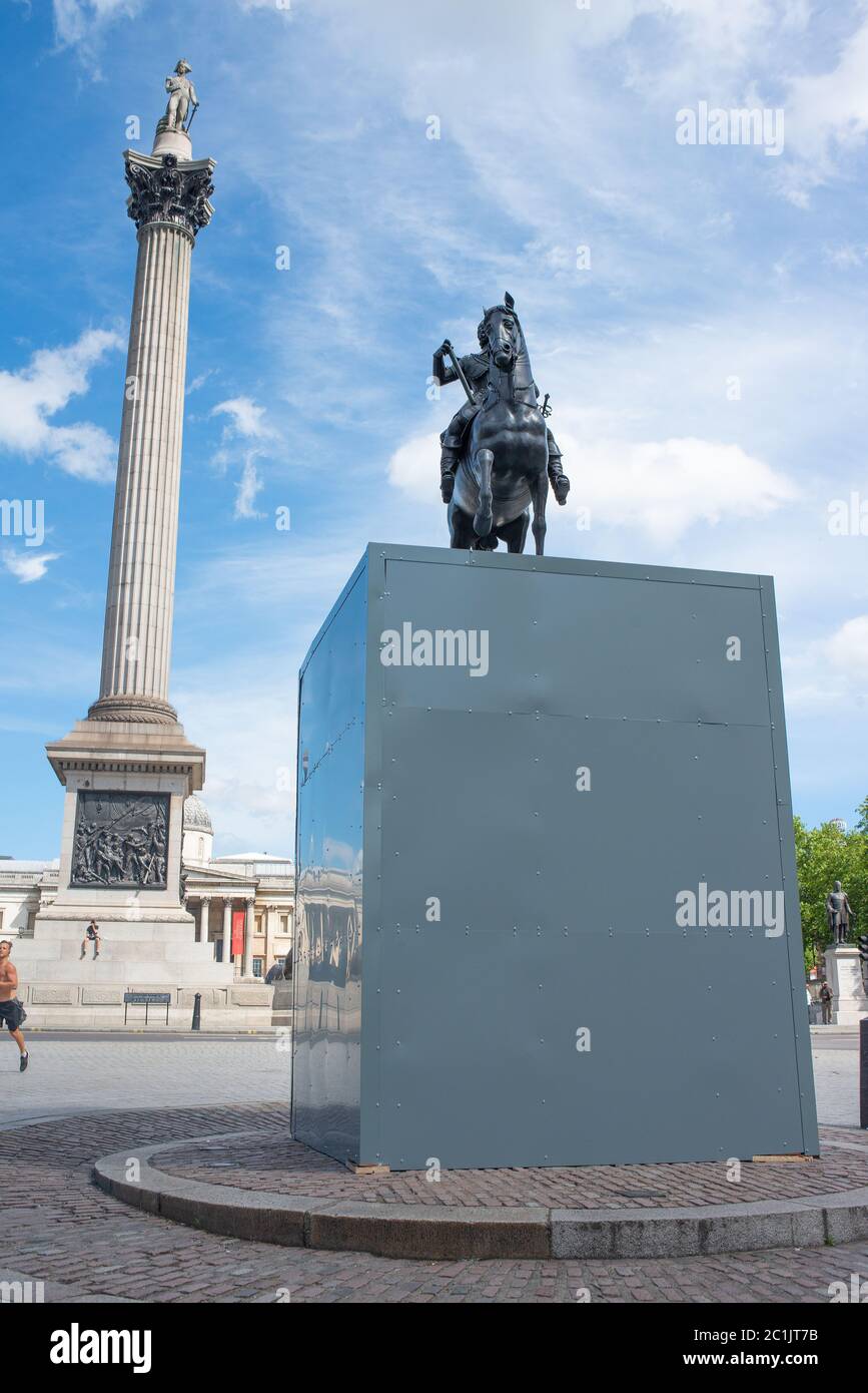 The statue of King Charles I is boarded up for it's protection, after recent Black Lives Matter protesters had been vandalising other historic statues Stock Photo