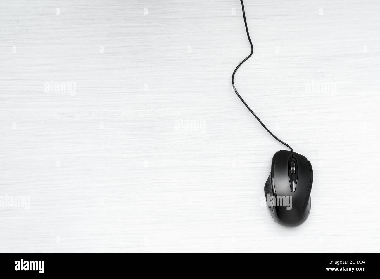 Simple black computer mouse Stock Photo - Alamy