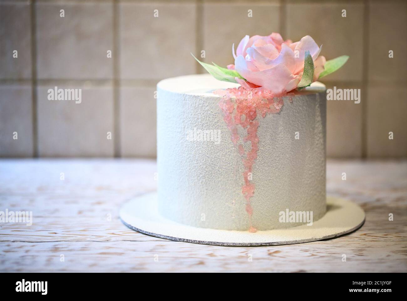 Wedding cake beautiful decorated with pink roses and sugar Stock Photo ...