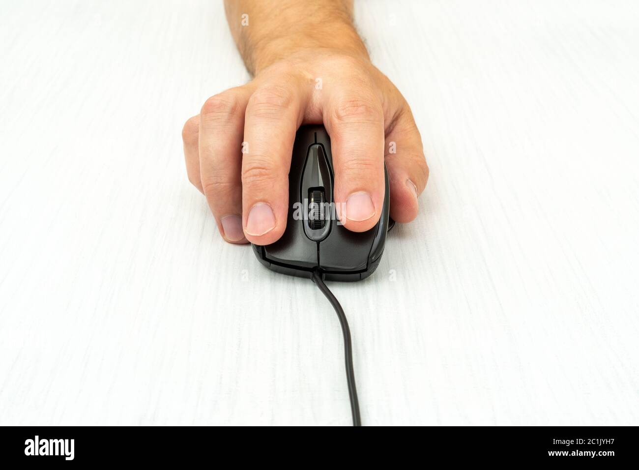 Man using a computer mouse,front view Stock Photo - Alamy