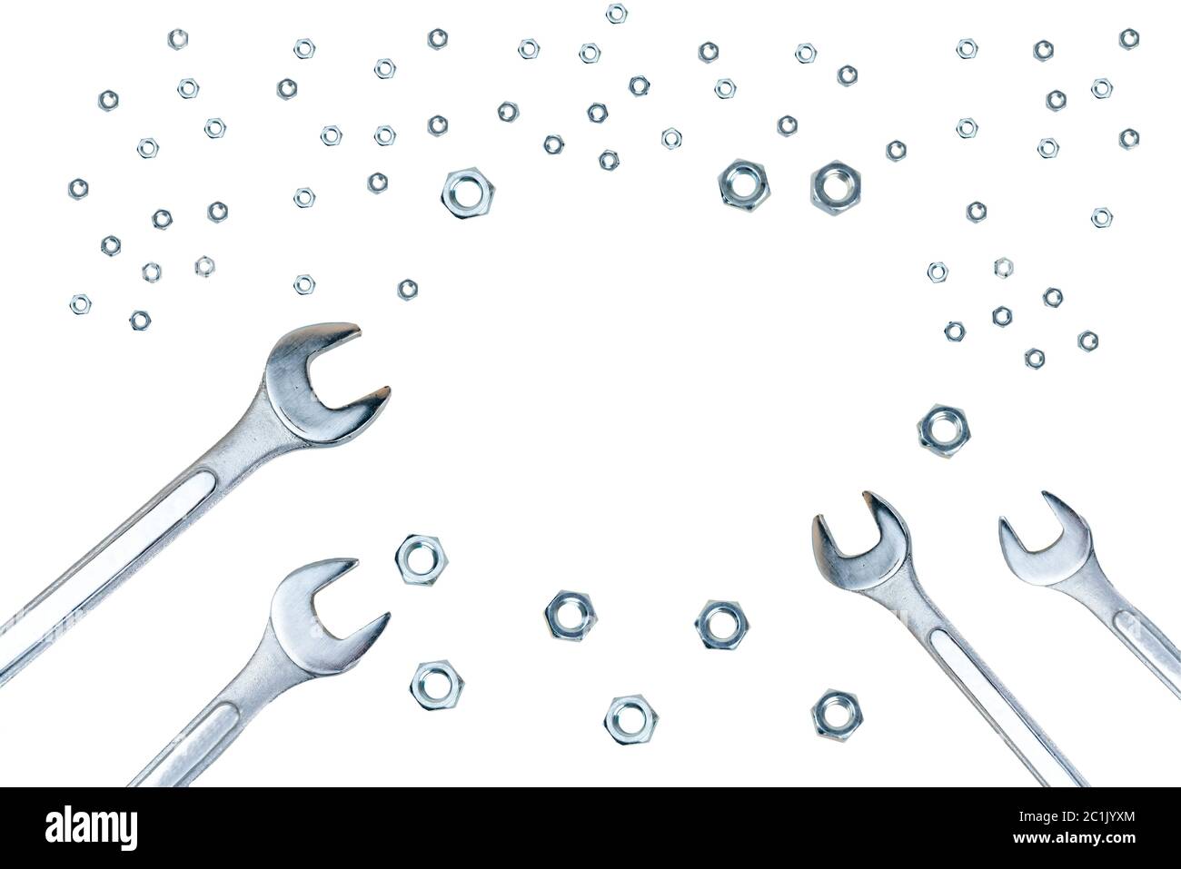 Spanners and screw nuts isolated on white background with copy space in center Stock Photo