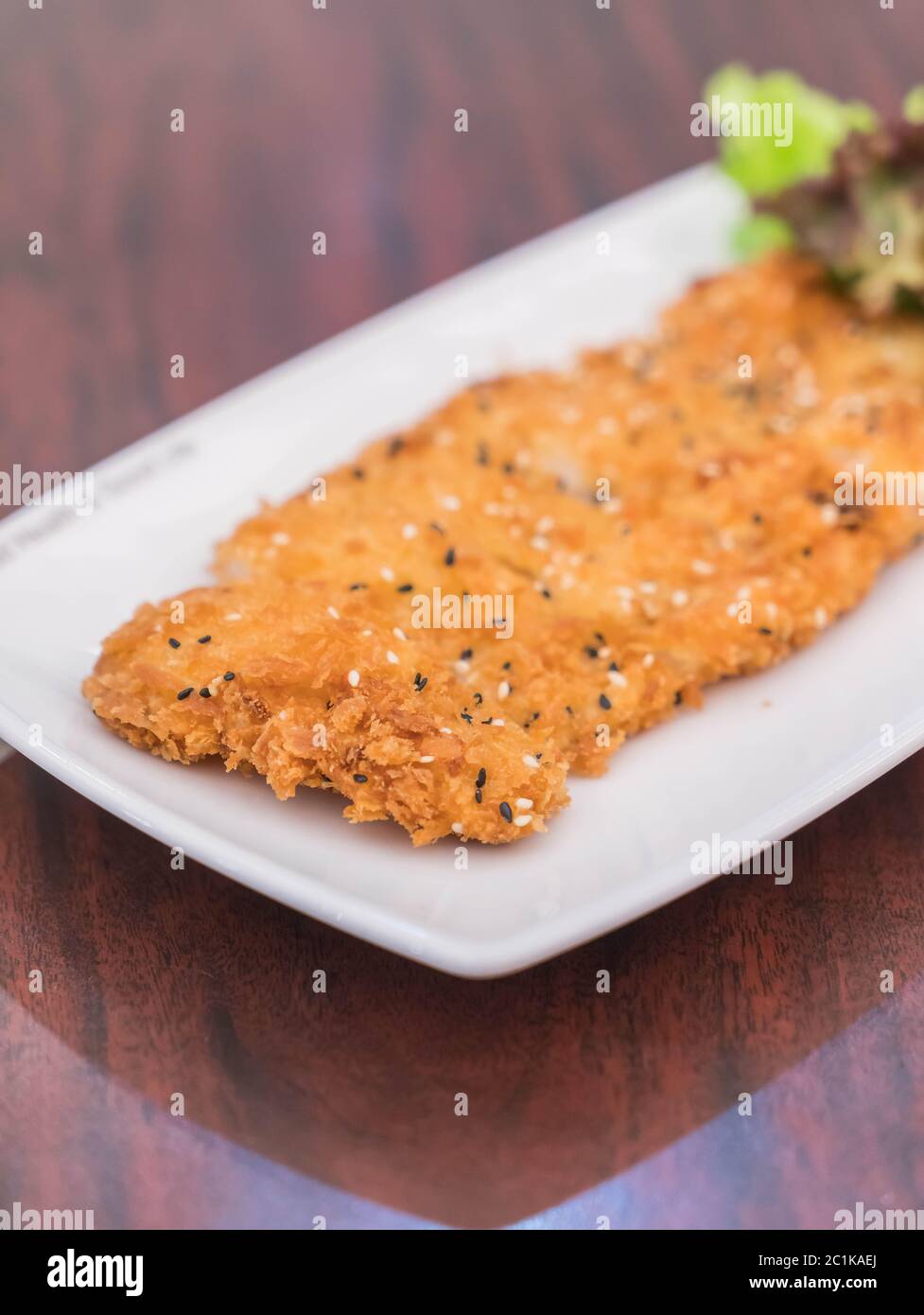 fried fish with Sesame Seeds Stock Photo - Alamy