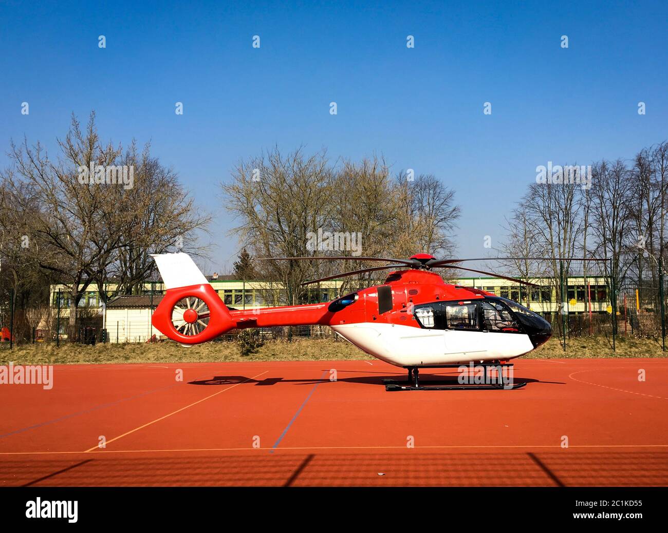 Rescue helicopter on a sports field Stock Photo