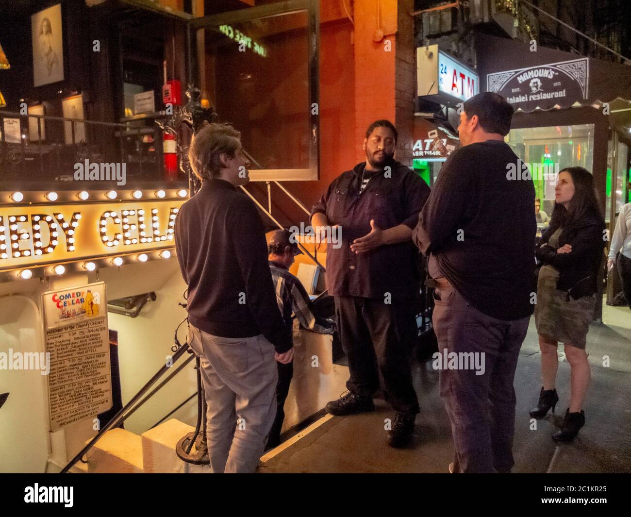 The bouncer at a night club on MacDougal Street in Manhattan's