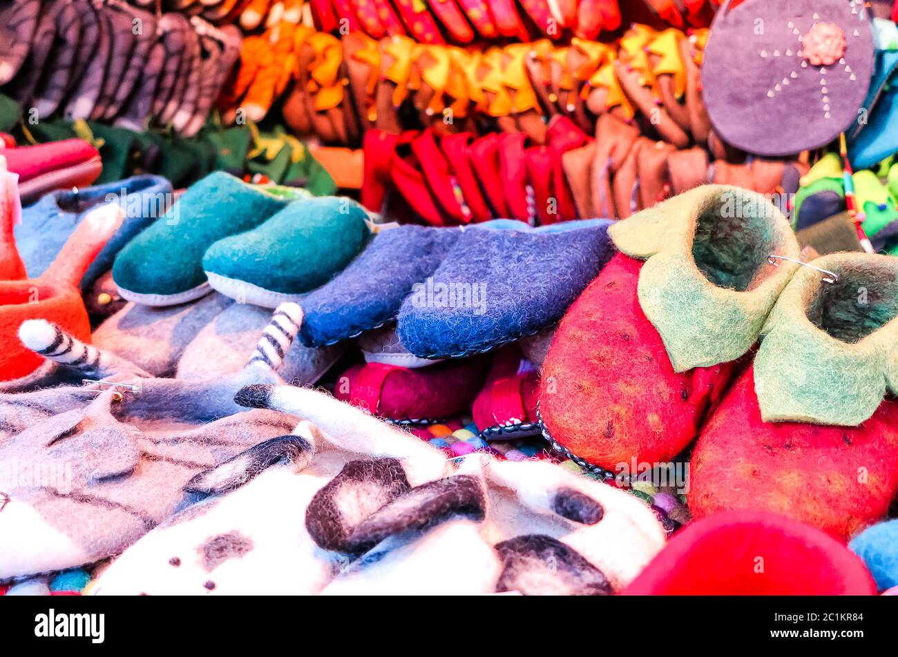 Colorful felt slippers at a German Christmas market Stock Photo
