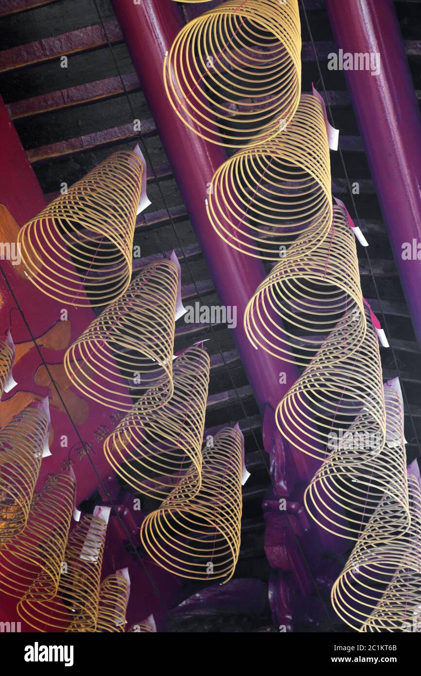 Spiral incense burning hanging in Vietnamese temple Stock Photo Alamy
