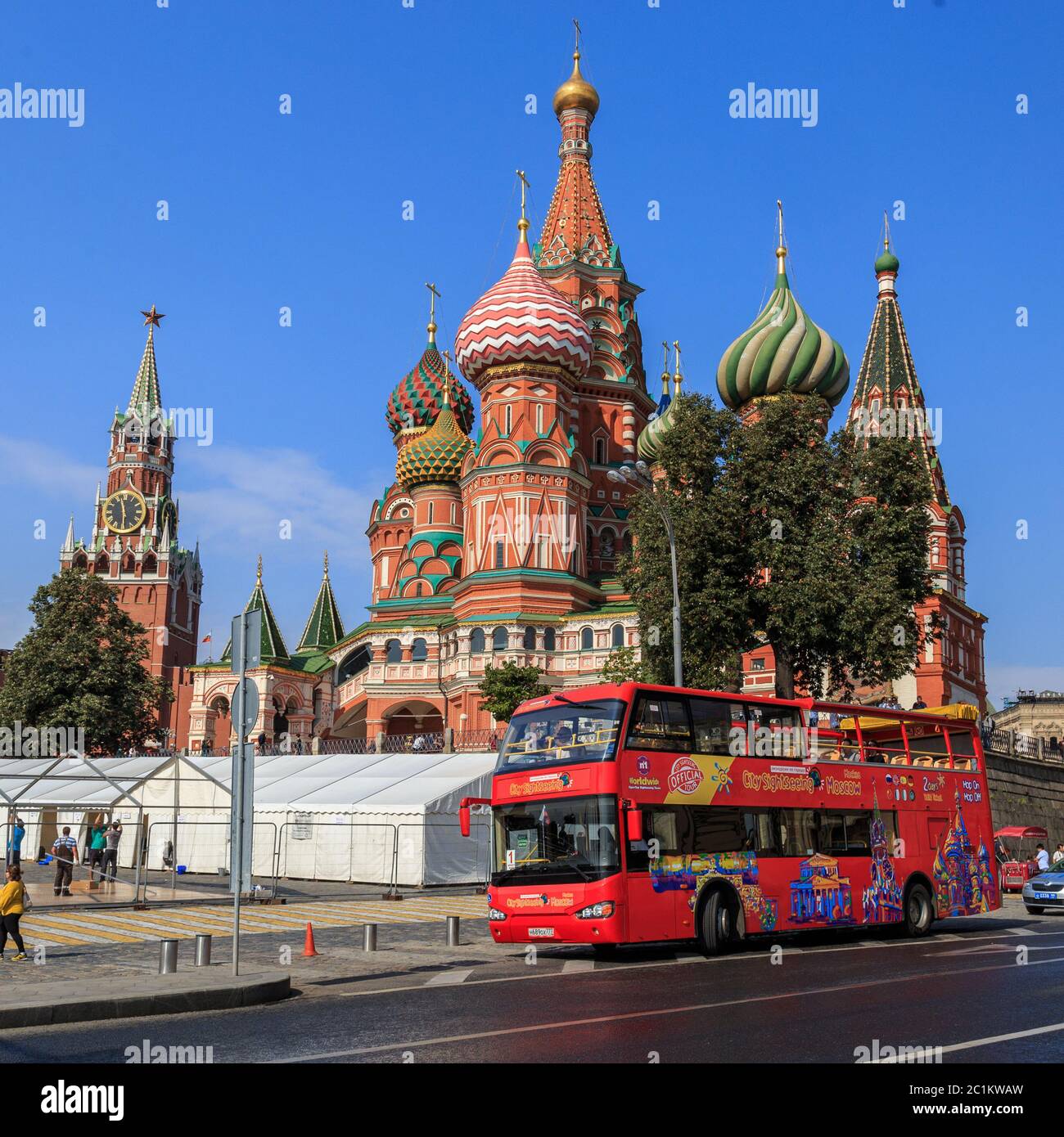 Moscow - September 4, 2018: Red tourist double-decker bus against the background of St. Basil Stock Photo